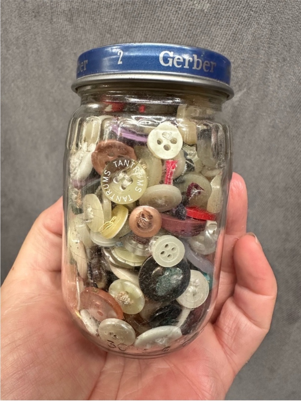 Vintage jar of assorted buttons